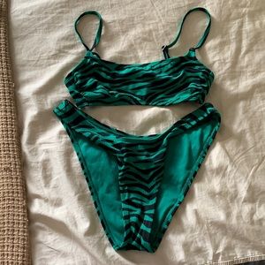 Xhilaration 2 piece. Green and black worn once. Top is sm bottom is a med.